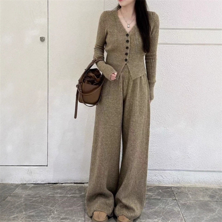 Kvinders strikket jumpsuit med knapdetaljer og afslappet pasform Stilla