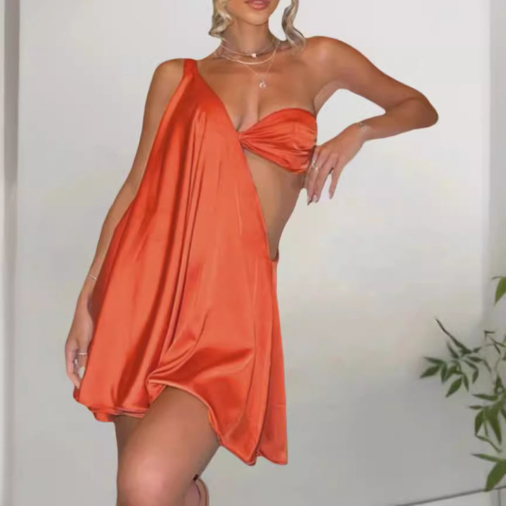 Dame asymmetrisk strandkjole med elegant stropdesign og flydende materiale Stilla