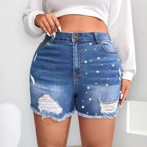 Dame fashionable destroyed denim shorts med perleapplikationer og frynset kant Stilla