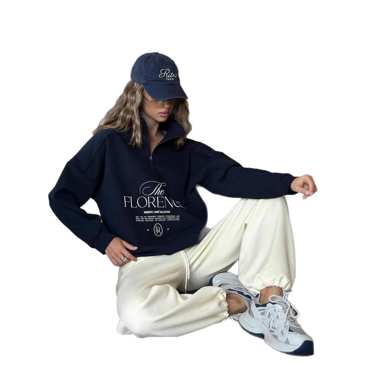Kvinders statement sweater med høj krave og praktisk lynlås Stilla