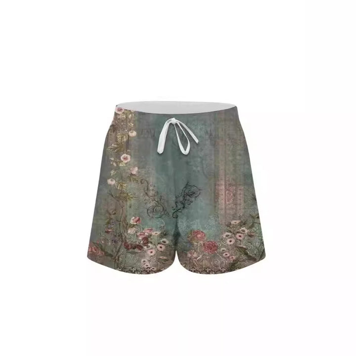Dame shorts med blomsterprint og sidelommer Stilla