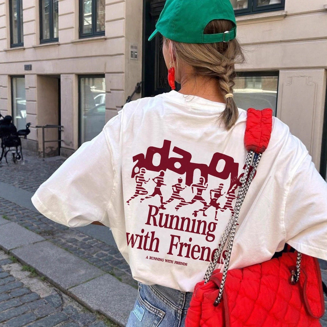 Dame Oversized T-shirt med kreativ tekst og afslappet snit Skovae