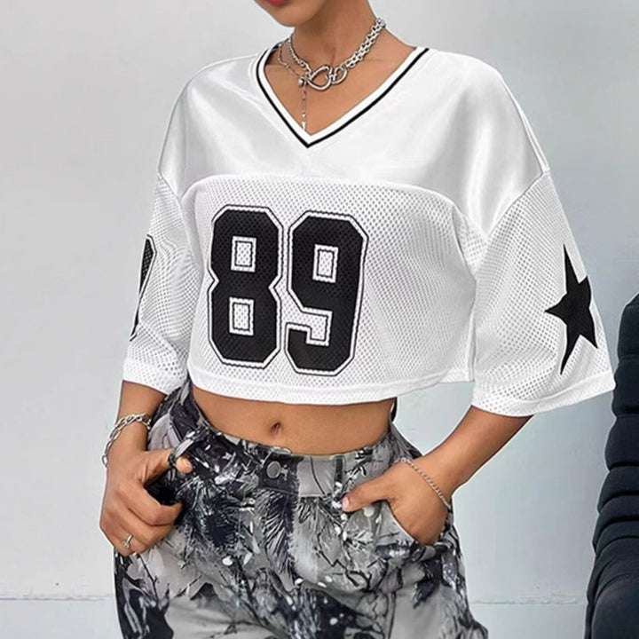 Dame sporty crop top lavet af åndbart mesh-materiale med nummer CD-Skovae