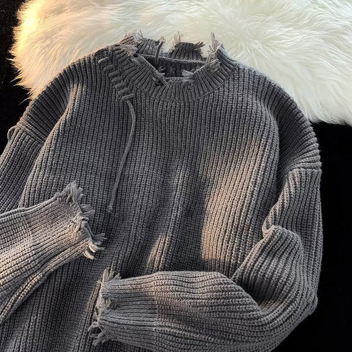 Dame Oversized Pullover med moderne frynser og unikke kontrastsyninger Stilla