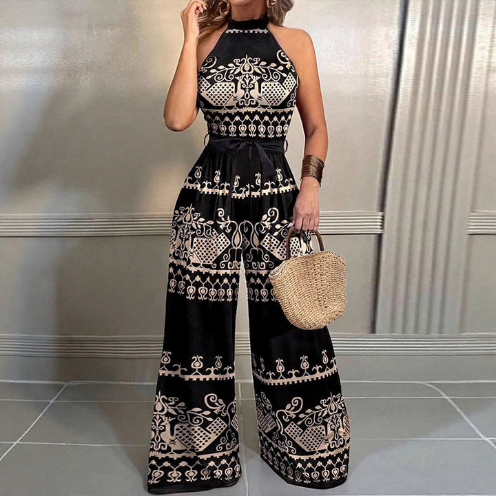 Dame jumpsuit med elegant halterdesign og stilfulde mønsterdetaljer Skovae
