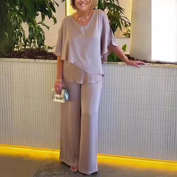 Dame elegant kombination af flydende overdel og vide buksedesign Stilla