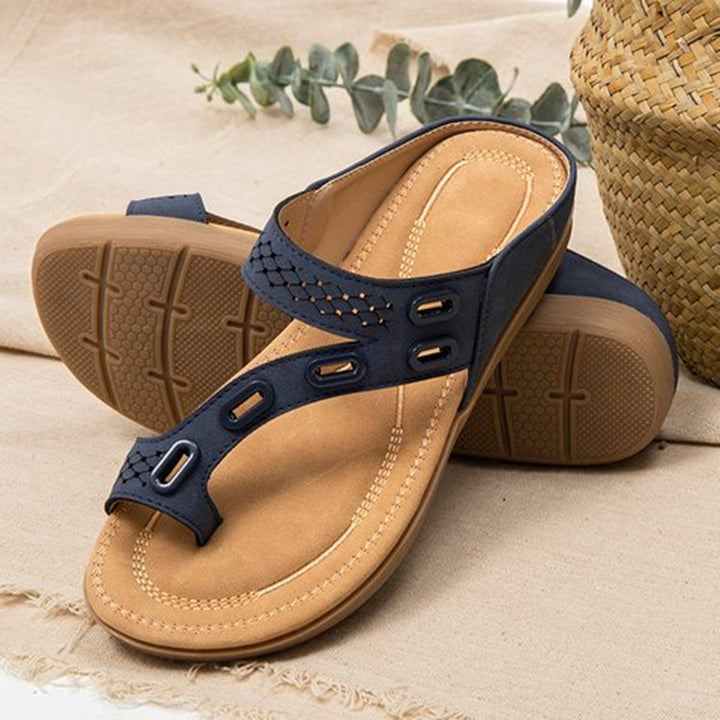 Dame toe separator med ergonomisk fodseng og moderigtigt rem-design Stilla