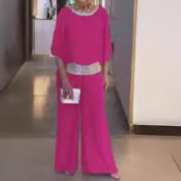 Dame elegant jumpsuit med glitrende taljebælte og flydende overdel Stilla