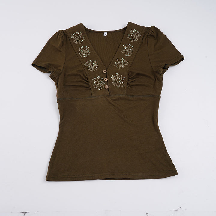 Dame T-shirt med blomsterbroderi og knaplukning Skovae