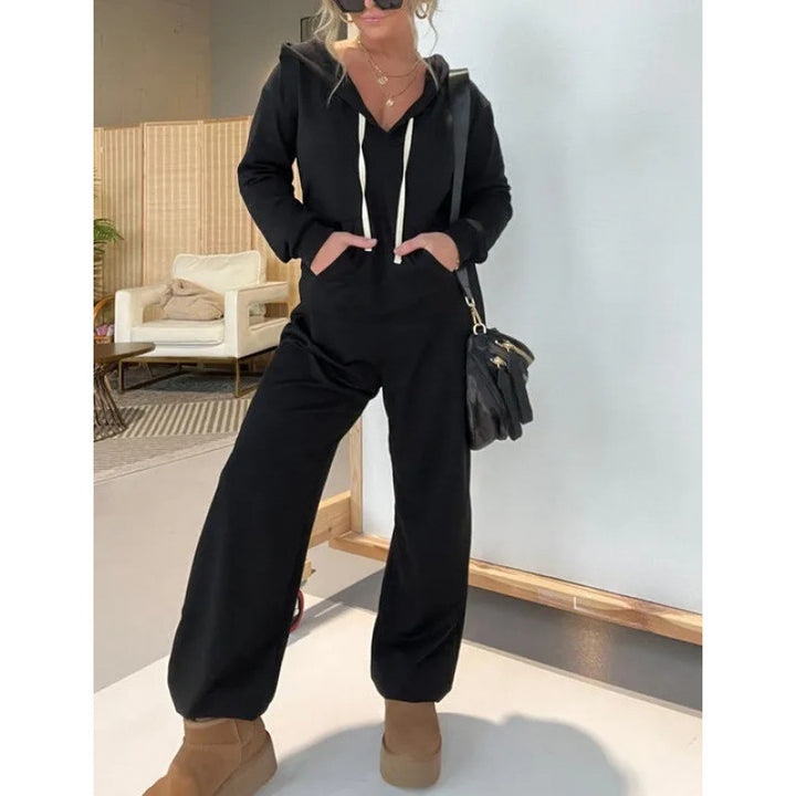 Dame hyggelig hættejumpsuit med løs pasform og praktiske lommer Stilla