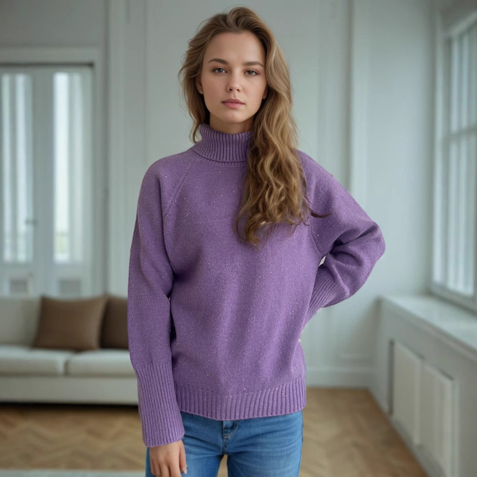 Damer elegant turtleneck sweater med struktureret strikdesign og glitrende accenter Stilla