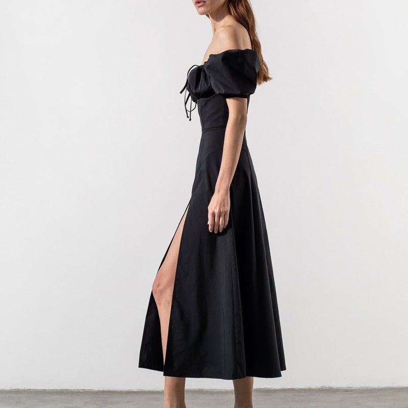 Kvindernes maxi kjole med off-the-shoulder design og voluminøse puffærmer Stilla