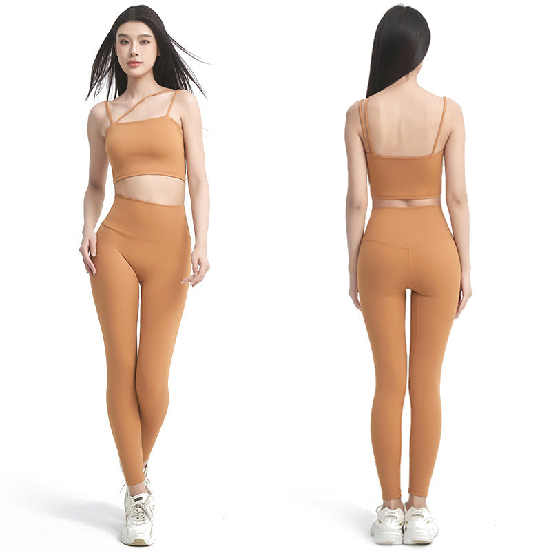 Dame Sporty Crop-Top og Leggings Sæt med praktiske lommer og elastisk talje Stilla