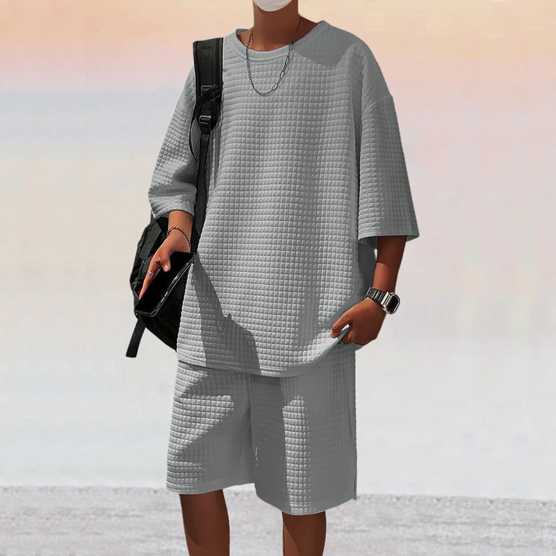 Herrer nan kvadratstruktur fritidsæt med oversized rundhalstrøje og knælange afslapningsshorts Skovae