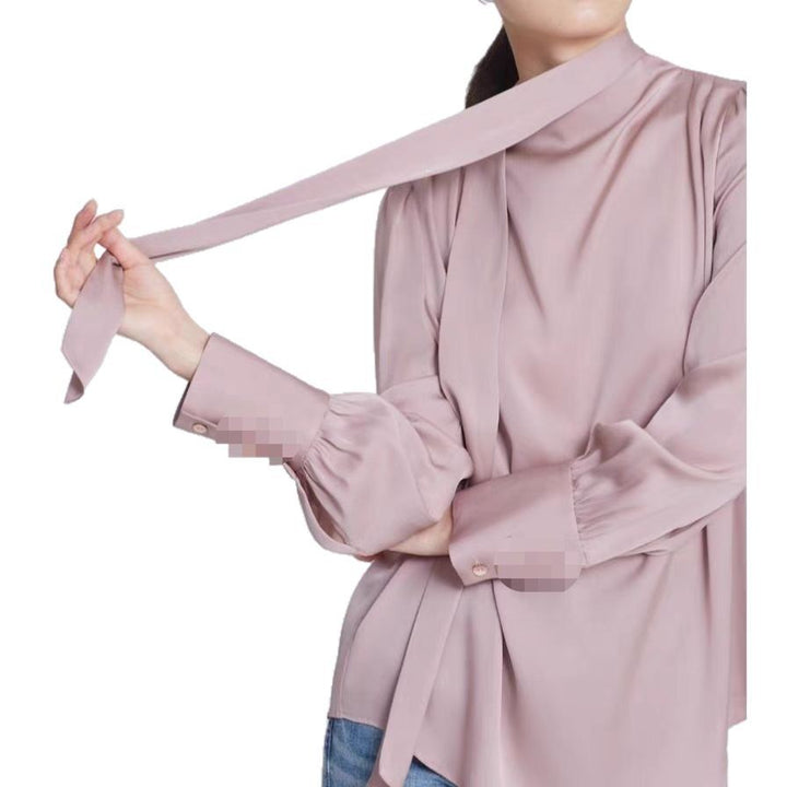 Dame elegant bluse med moderigtig bånd og voluminøse ærmer Stilla