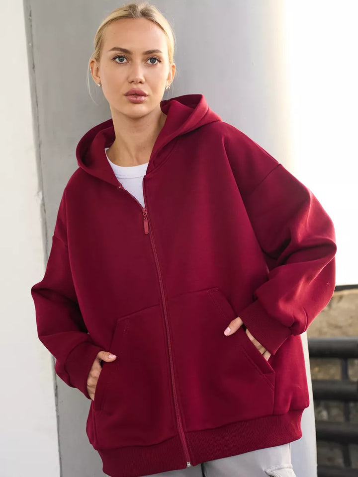 Kvinders afslappede hoodie med fuld lynlås og store lommer