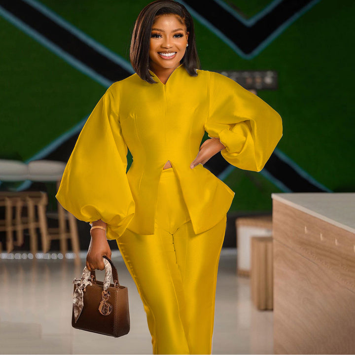 Dame elegant ensemble med voluminøse ærmer og slank silhuet Stilla