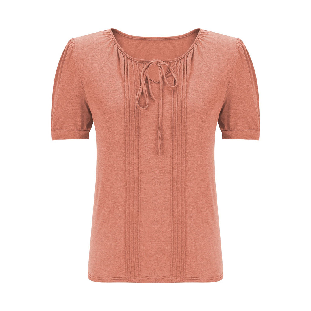 Damebluse med puffærmer og raffineret halterneck Stilla