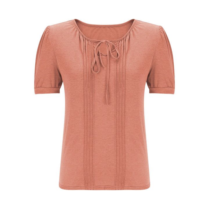 Damebluse med puffærmer og raffineret halterneck Stilla