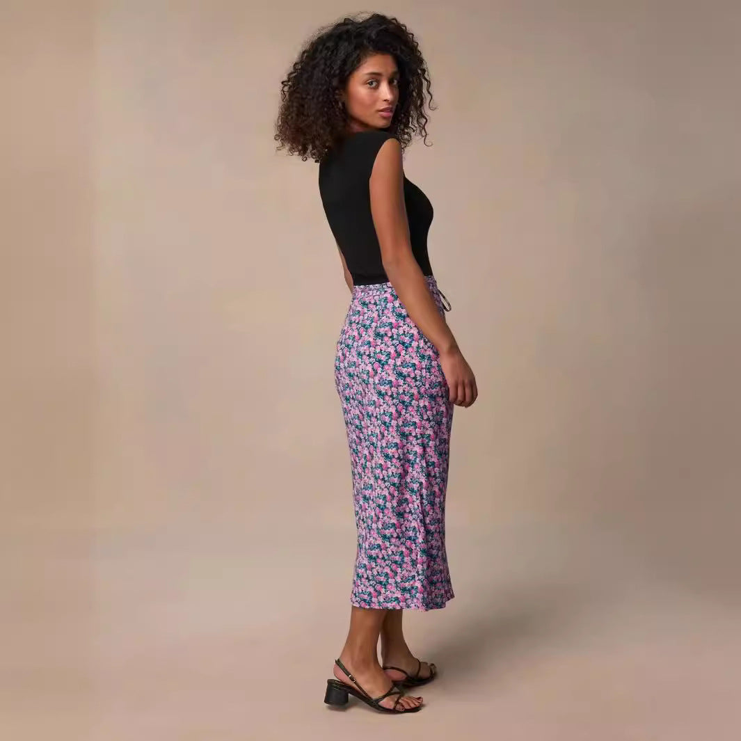 Dame Midirock med floral print og diskrete flæsedetaljer Stilla