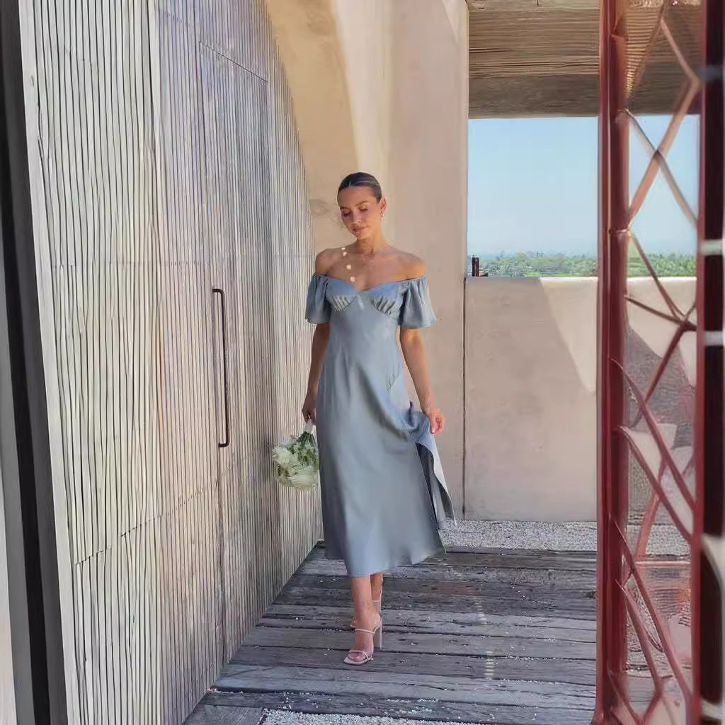 Damer elegant Off-Shoulder Maxikjole med sidelids og luftige flæsedetaljer Stilla