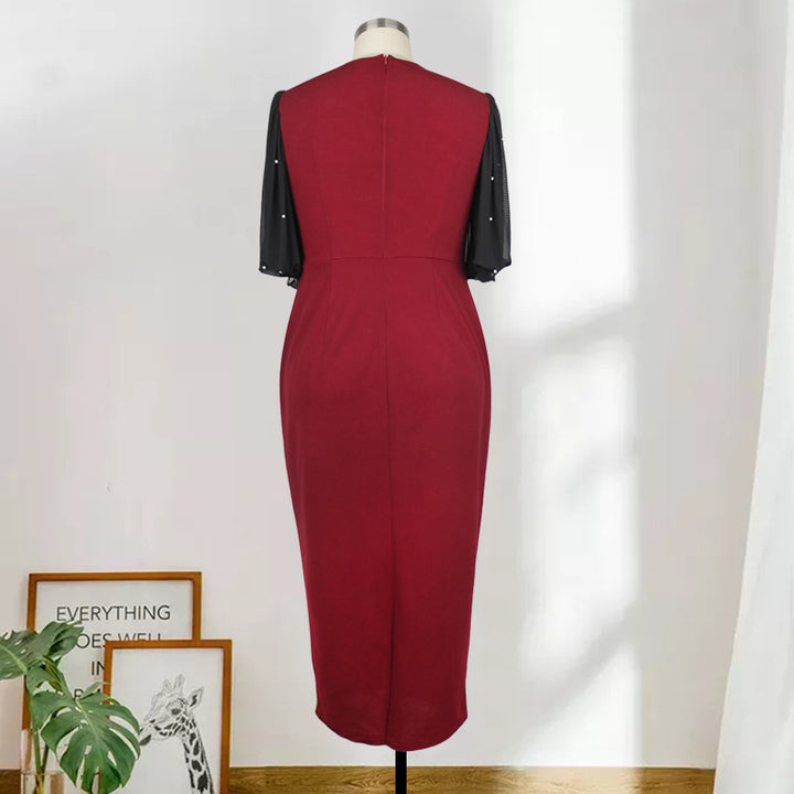 Damekjole med elegante gennemsigtige ærmer Skovae