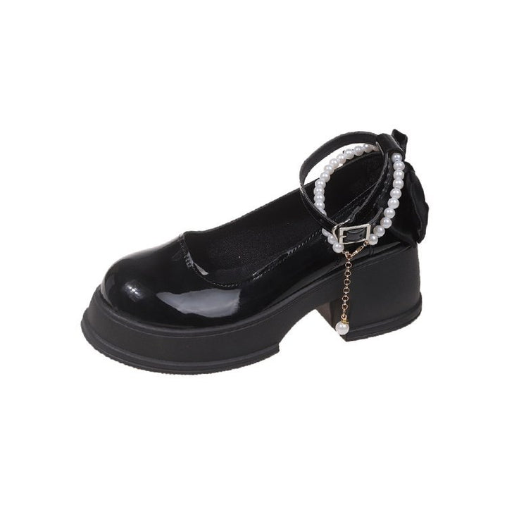 Dame elegante pumps med dekorativ ankelrem og stilfuld sløjfe accent Stilla