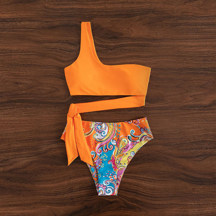 Dame bikini-sæt med asymmetrisk overdel og floral design Stilla