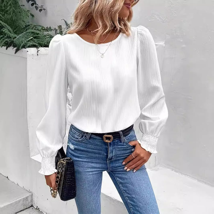 Damer elegant bluse med ribstruktur og puffærmer Stilla
