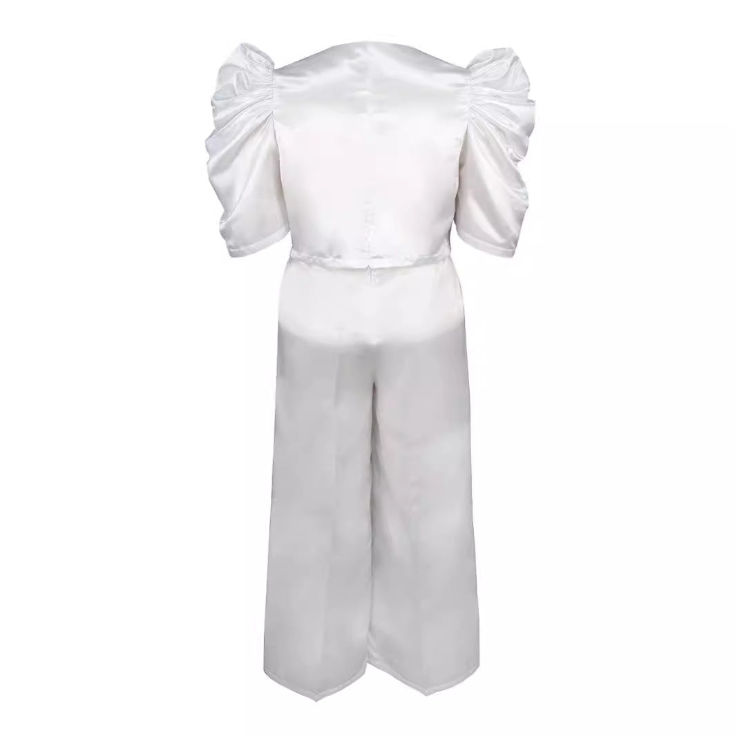 Damer Elegant jumpsuit med voluminøse puffærmer og smart talje detaljer Skovae