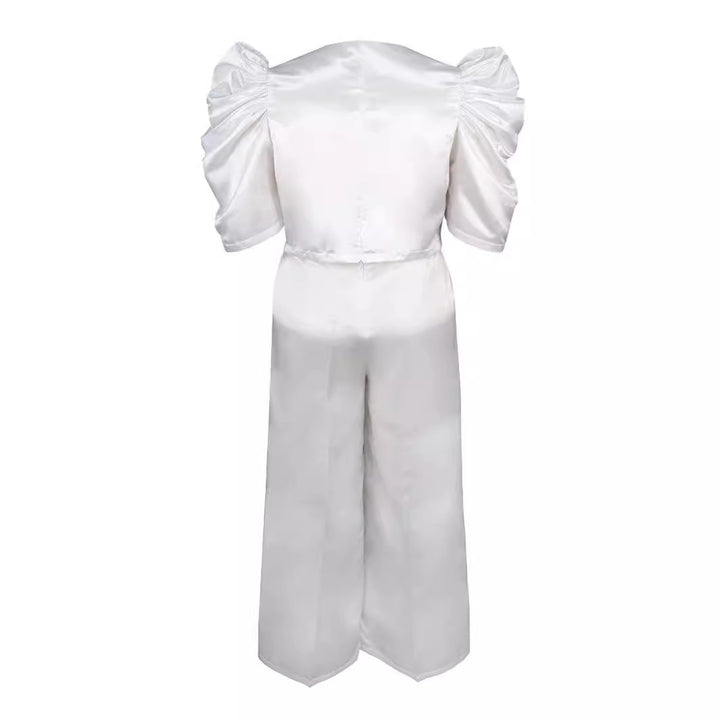 Damer Elegant jumpsuit med voluminøse puffærmer og smart talje detaljer Skovae