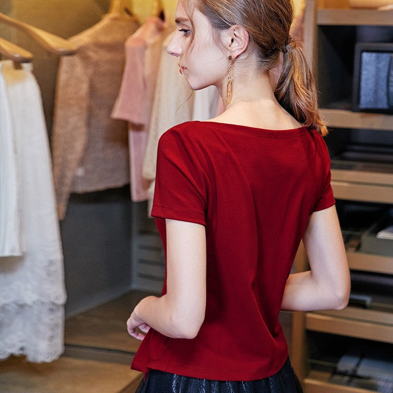 Dame top med elegant omslagsdesign og feminin drapering Stilla