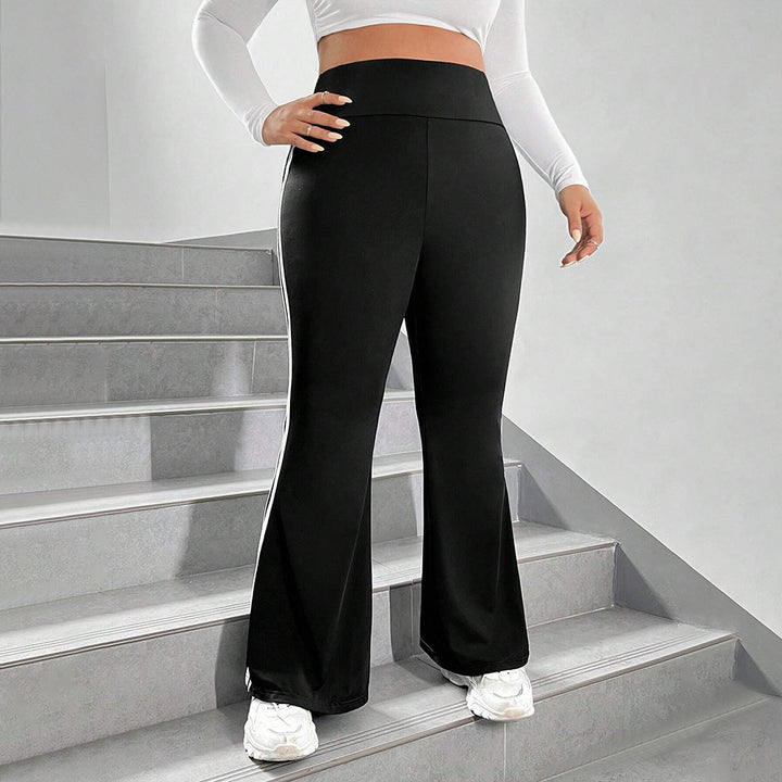 Damer Sporty Flared Leggings med elastisk talje og sidelange striber Stilla