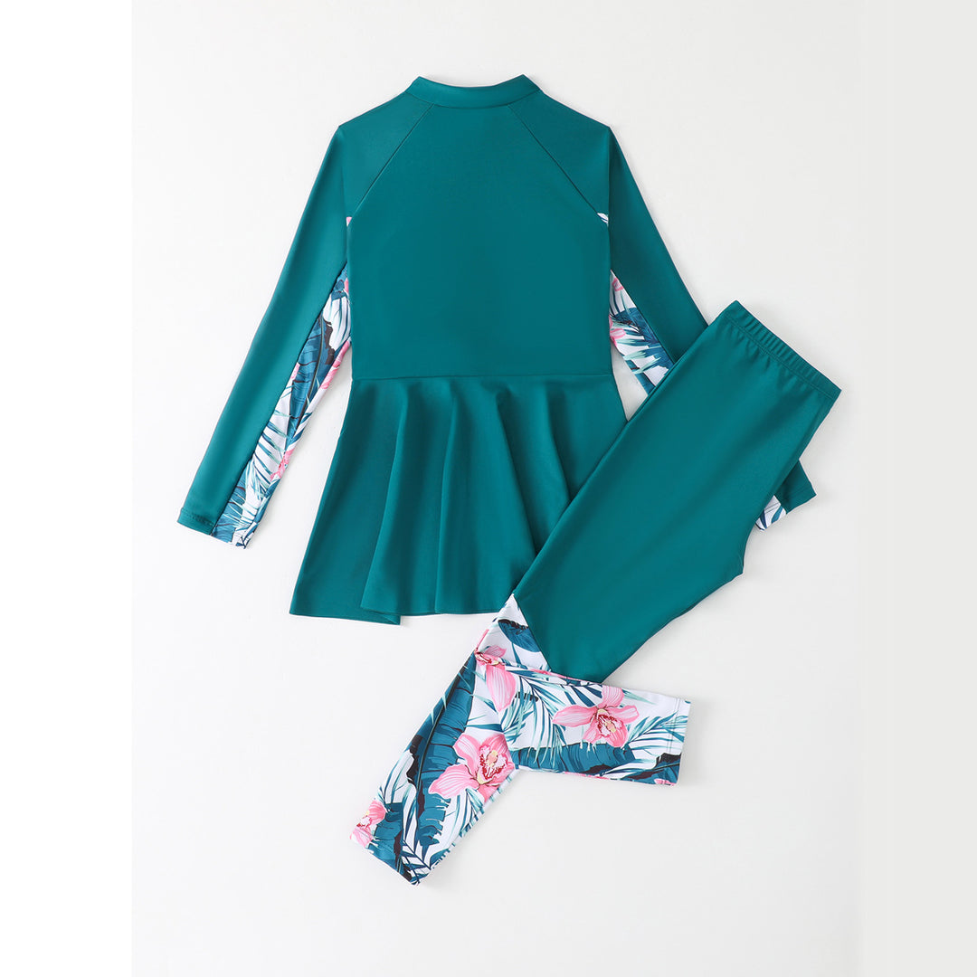 Dame todelt surfingdragt med moderne zip-design og tropisk print Stilla
