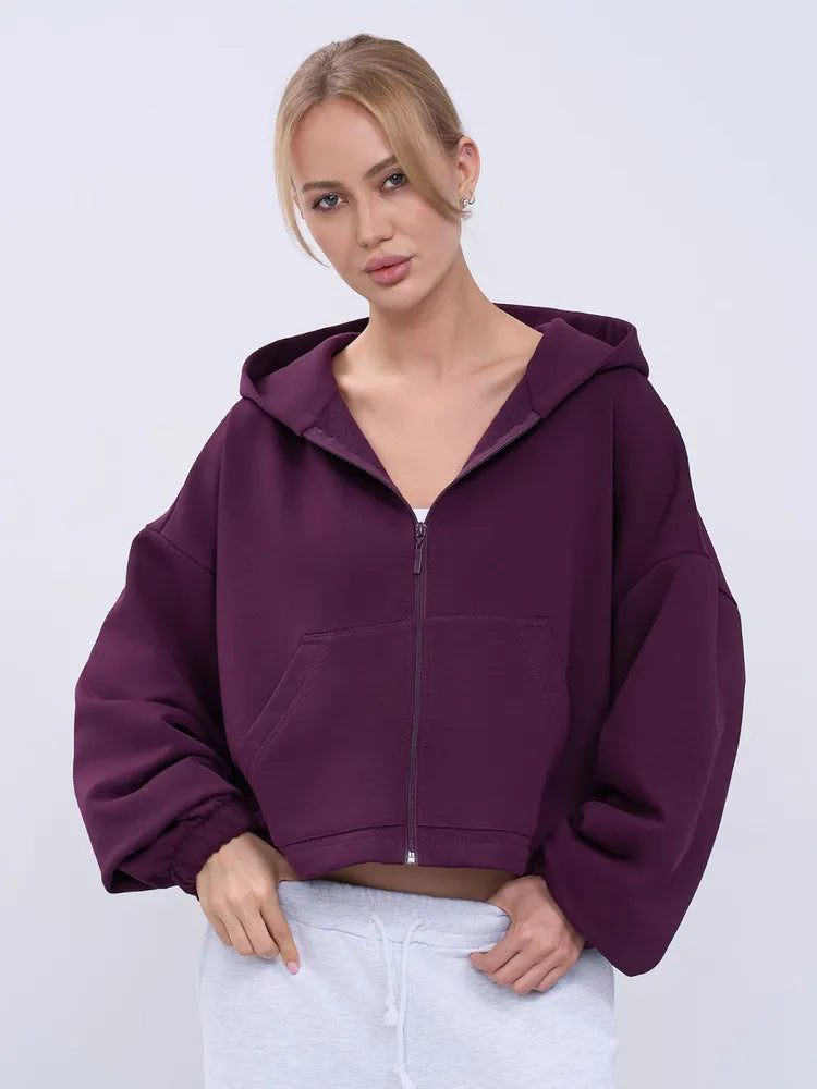Dame cropped hoodie jakke med voluminøse ærmer og praktiske lommer Skovae