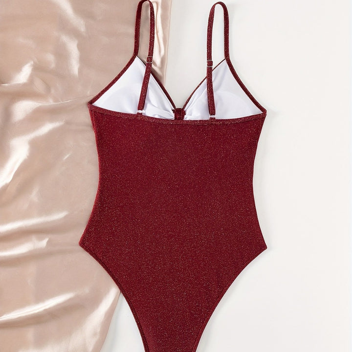 Dame one-piece badedragt med raffineret udsnit og stilfuld knude detalje Stilla