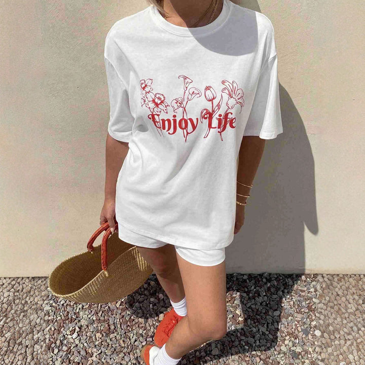 Dame Løs oversized T-shirt med blomsterprint og inspirerende tekst Skovae