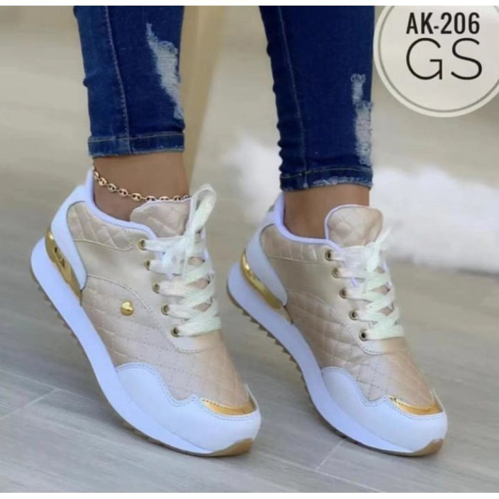 Dame sporty sneakers med elegant guldaccent og åndbart overmateriale Stilla