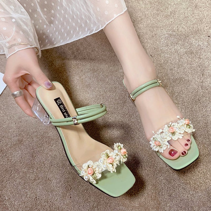 Dame Sandaletter med transparent rem og florale accenter Stilla