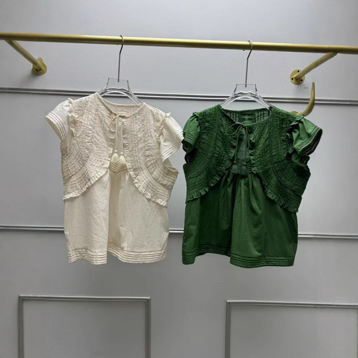 Damebluse med voluminøse ærmer og fine broderidetaljer Stilla