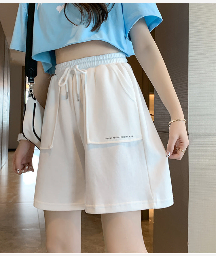 Femme Relaxed Fit Snorebånd Lounge Shorts med funktionelle lommer Stilla