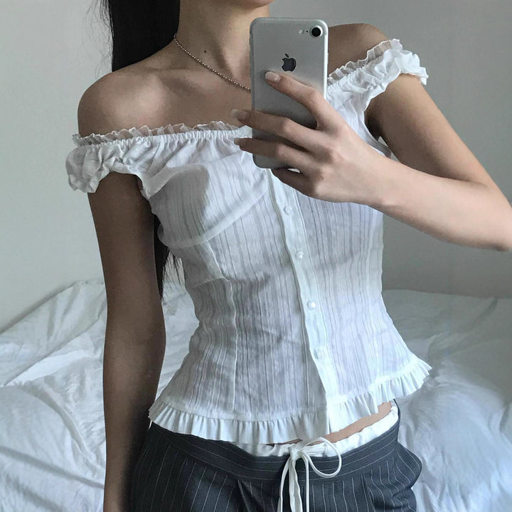 Dame Off-Shoulder Bluse med flæsekanter og knapdetaljer Skovae