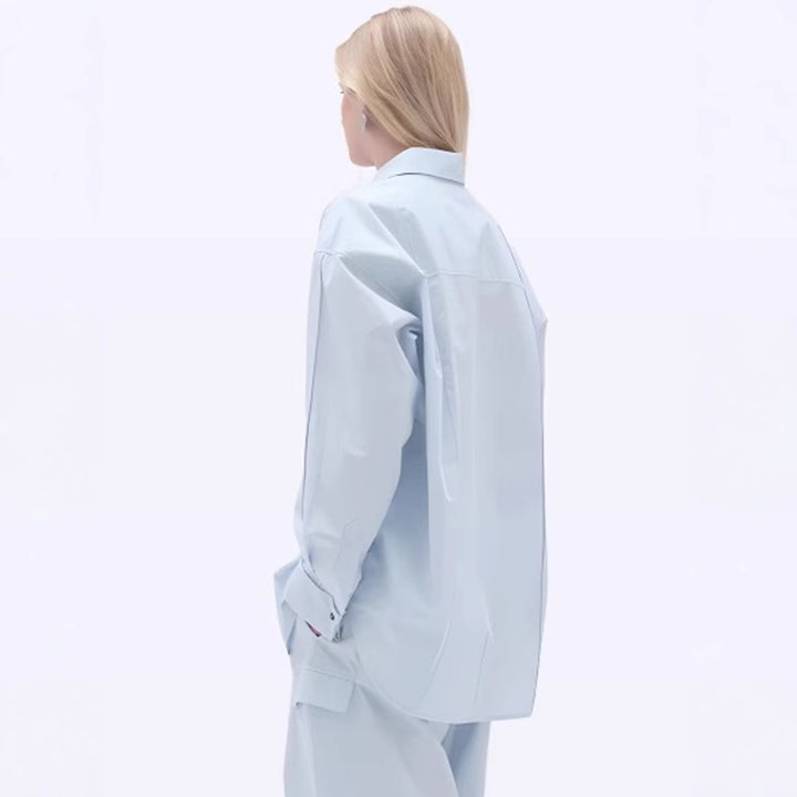 Kvindernes langærmede bluse med moderne snit og elegante detaljer Stilla