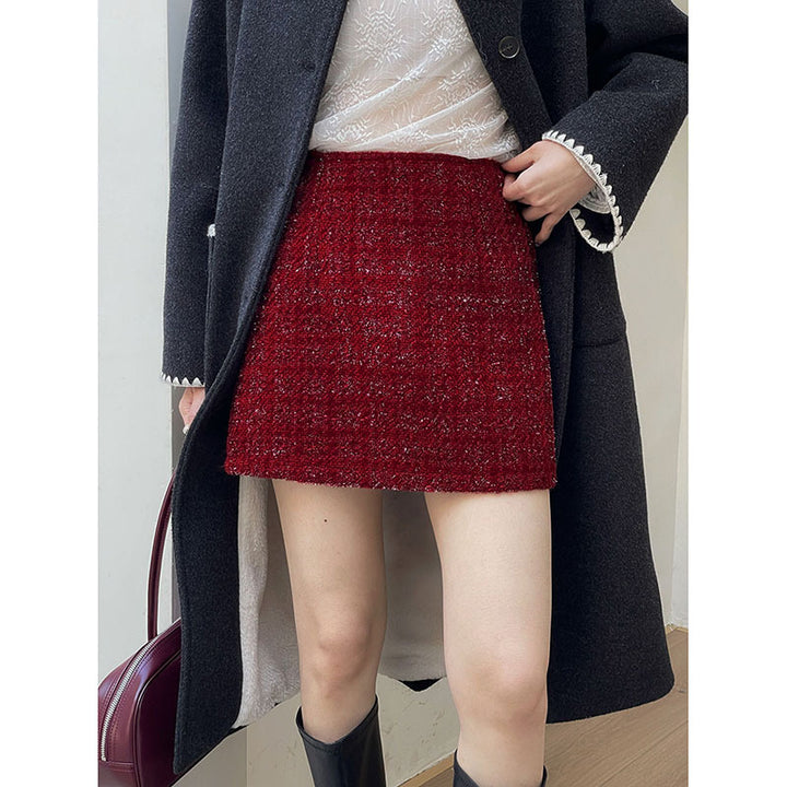 Damer stylish mini nederdel lavet af struktureret bouclé-stof med elegant snit Stilla