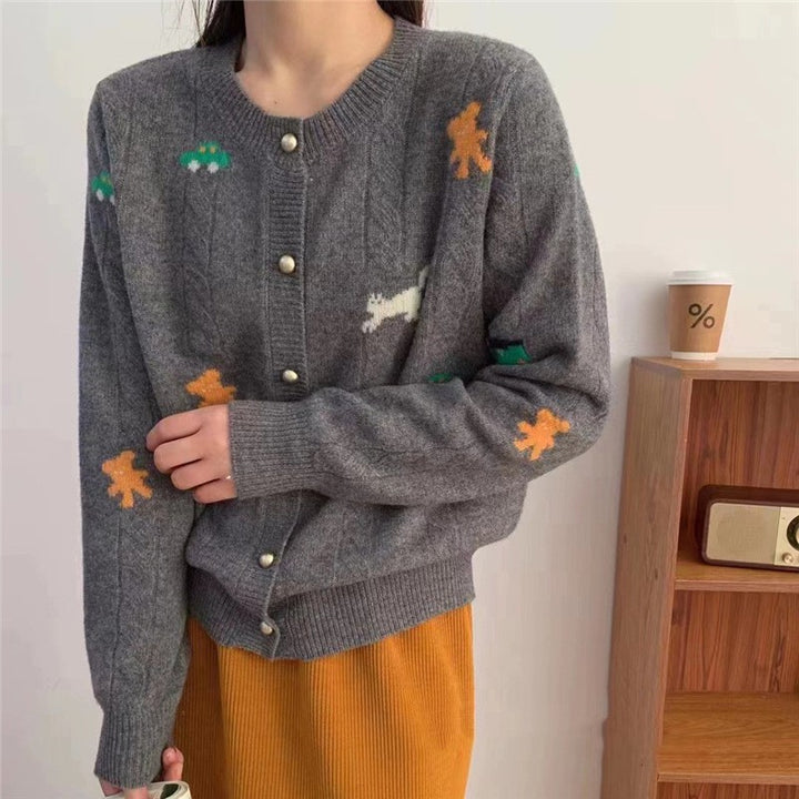 Kvinders hyggelige strikkede cardigan med legende design og praktiske knapper Stilla