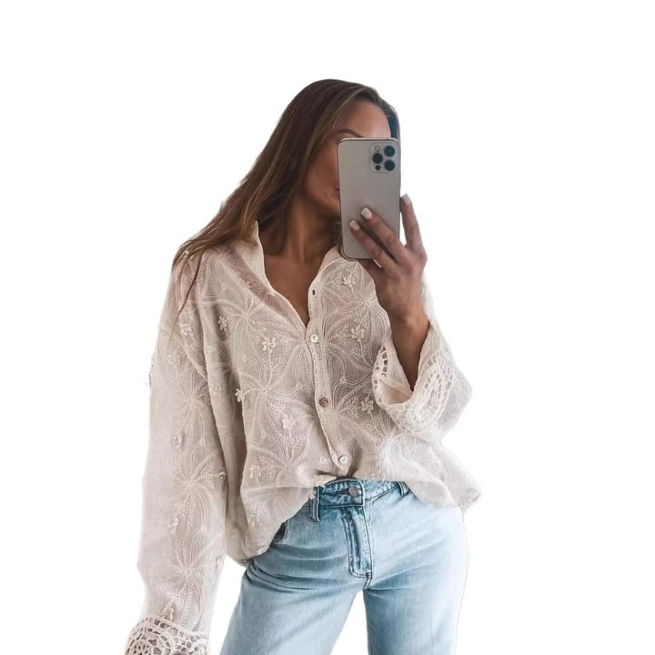 Dame blusset spidsbluse med florale broderier og afslappet snit Stilla