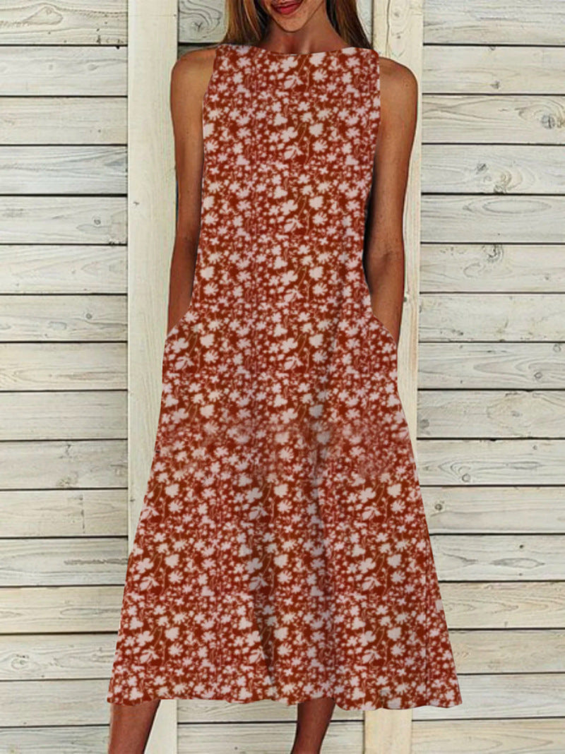 Dame maxikjole med blomstermønster og sidelommer Stilla