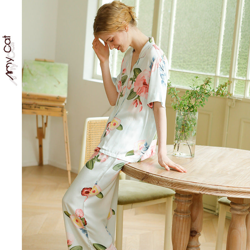 Dame elegant pyjamasæt med blomstret design og knapbar top Stilla