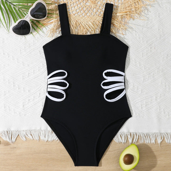 Dame heldragt badedragt med raffinerede cut-outs og moderne skulderstropper Stilla
