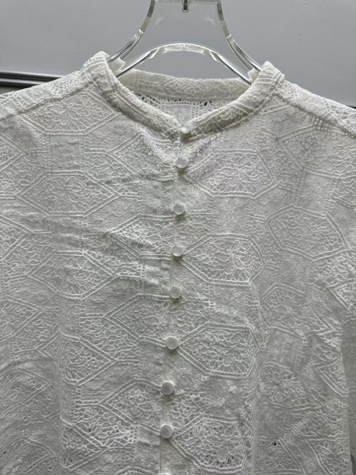 Dame spidsetop med elegante trompetærmer og fine detaljer Stilla